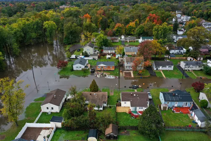 An aerial view of a residential area in Middlesex County, New Jersey as floodwaters covers street hit by a nor'easter in October. 2021